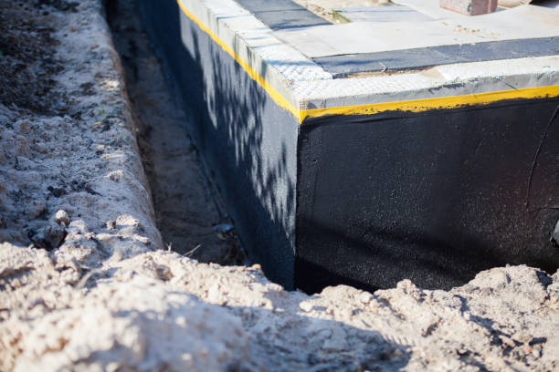 Professional Waterproofing technician working in Riga, MI